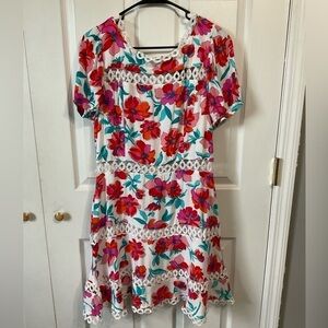 B darlin floral dress with peek a boo detailing. Size 15/16